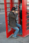 Tourist with phone box, London