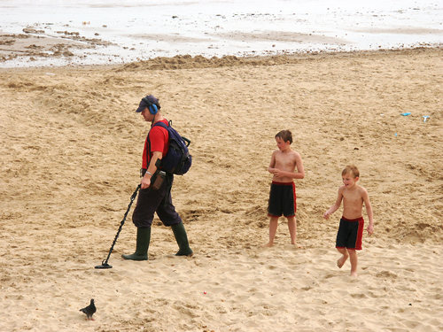 Metal detector and two boys, Bournemouth