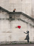 Banksy graffiti and woman, London