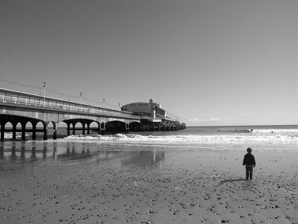 Pier and boy, Bournemouth