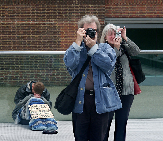 Happy tourists with cameras, London